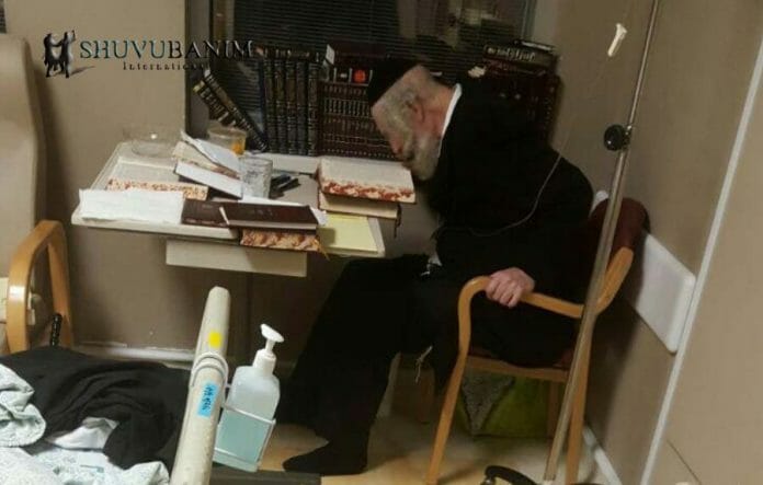 Rav Berland studying Torah in Hadassah hospital immediately after a serious operation